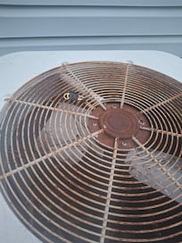 Wires sticking out the the AC unit.