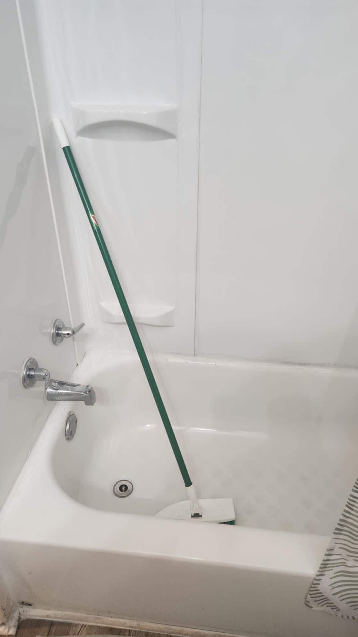 Can't remove scrub brush in bath!