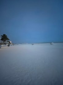 Clear blue skies and clean white sands