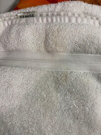 Brownish towels, looks dirty , some shredding on one end ( not pictured ).