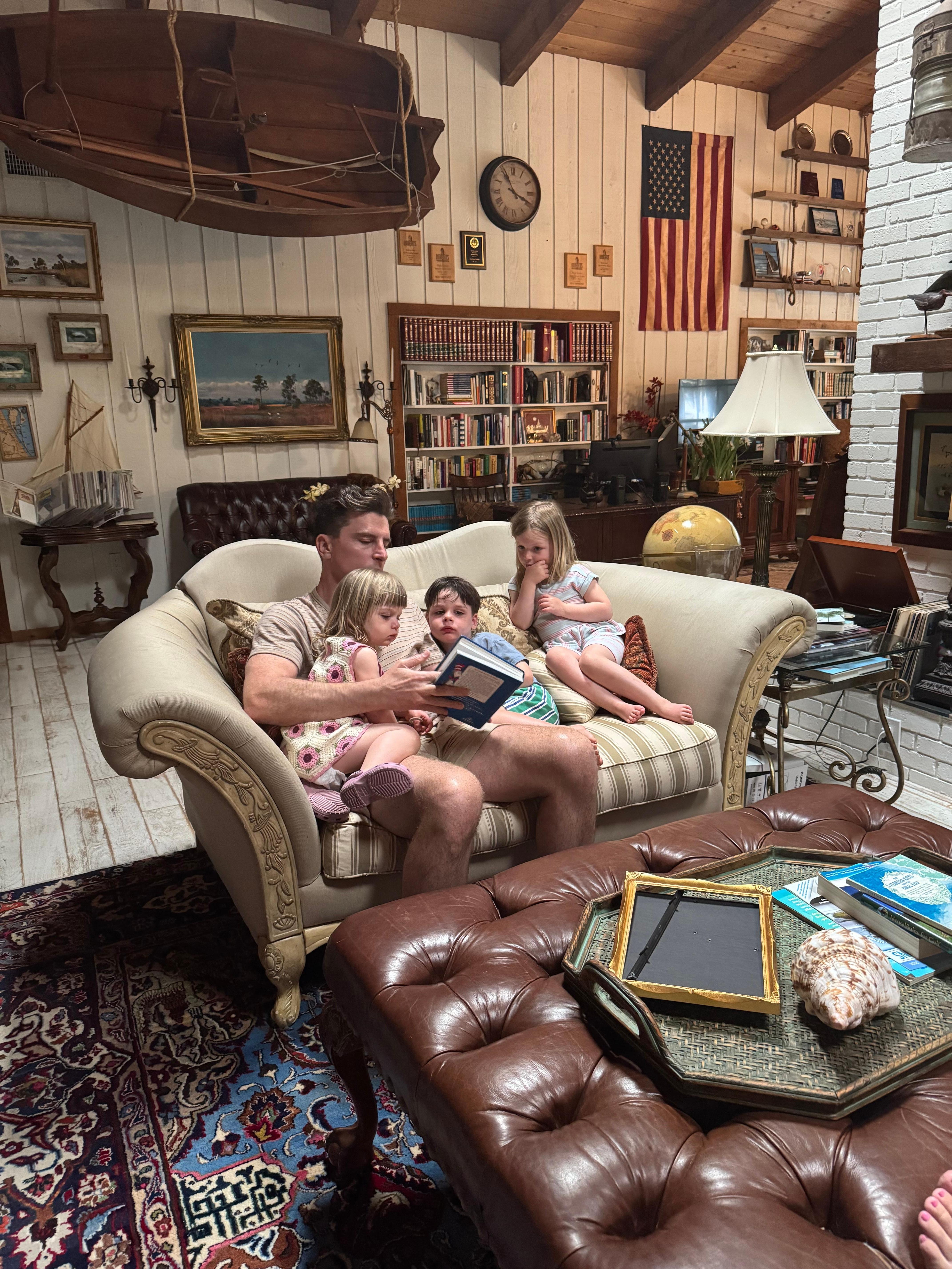 Bedtime stories on the comfy couch. 