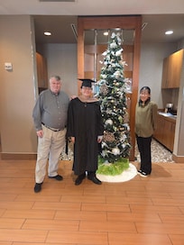 Son's graduation from University of West Florida in Pensacola with his MBA. Proud mom and dad.