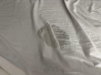 Threadbare, bleach-burned sheets.