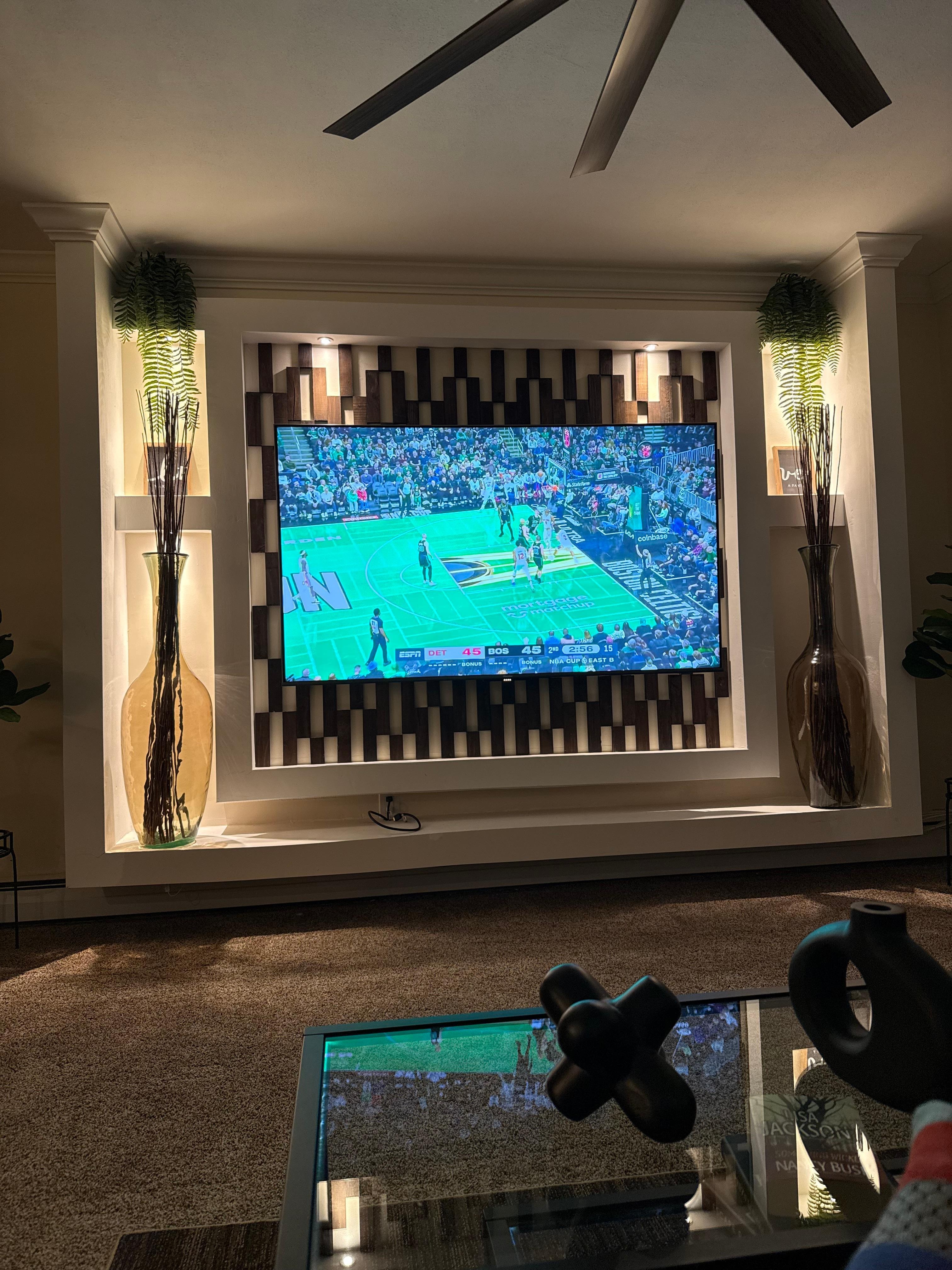 The tv setup in the living room is awesome. 