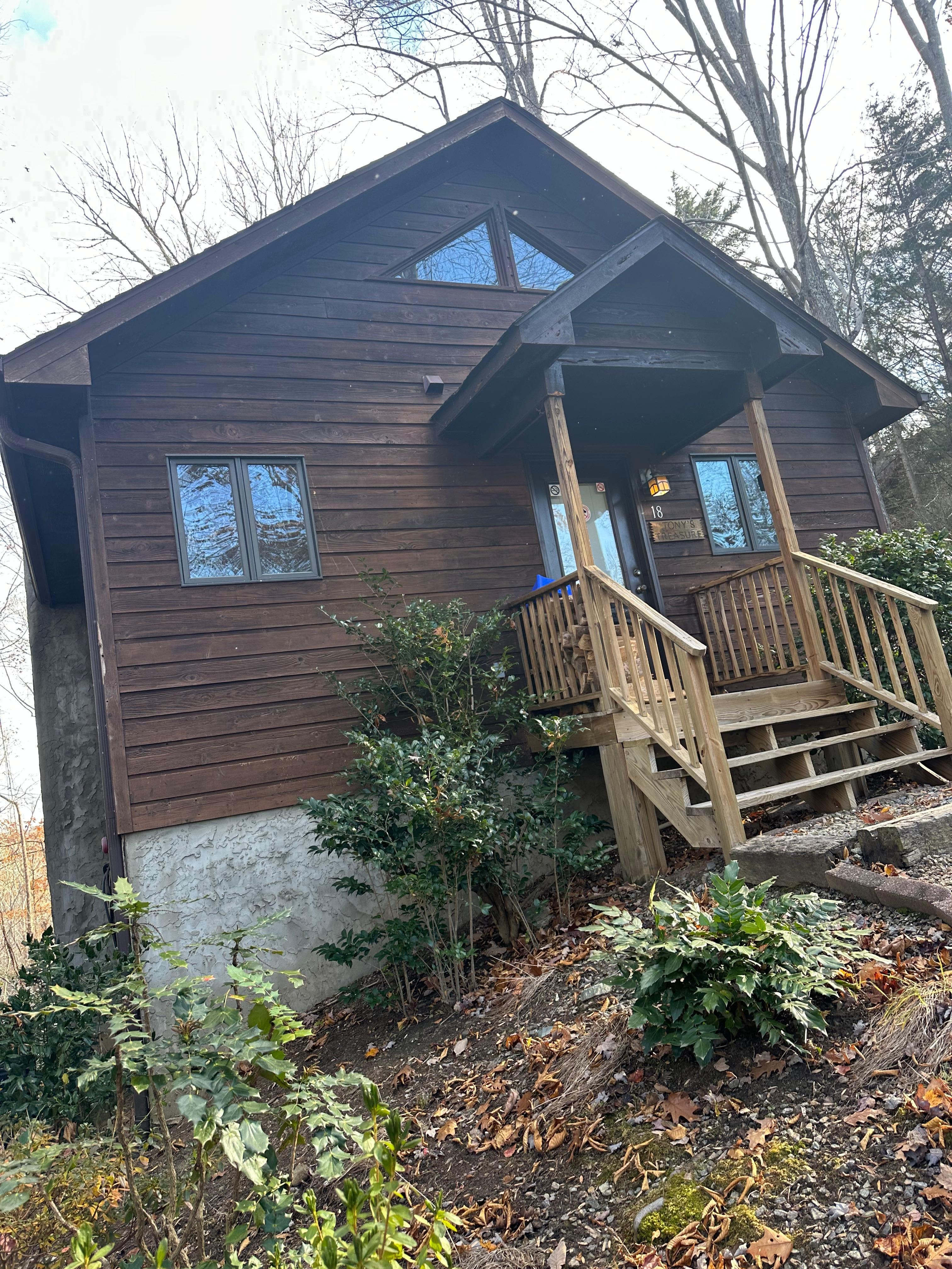 This is what you see when you drive up. Larger porch on back with great view. 