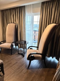 Unique chairs and a balcony