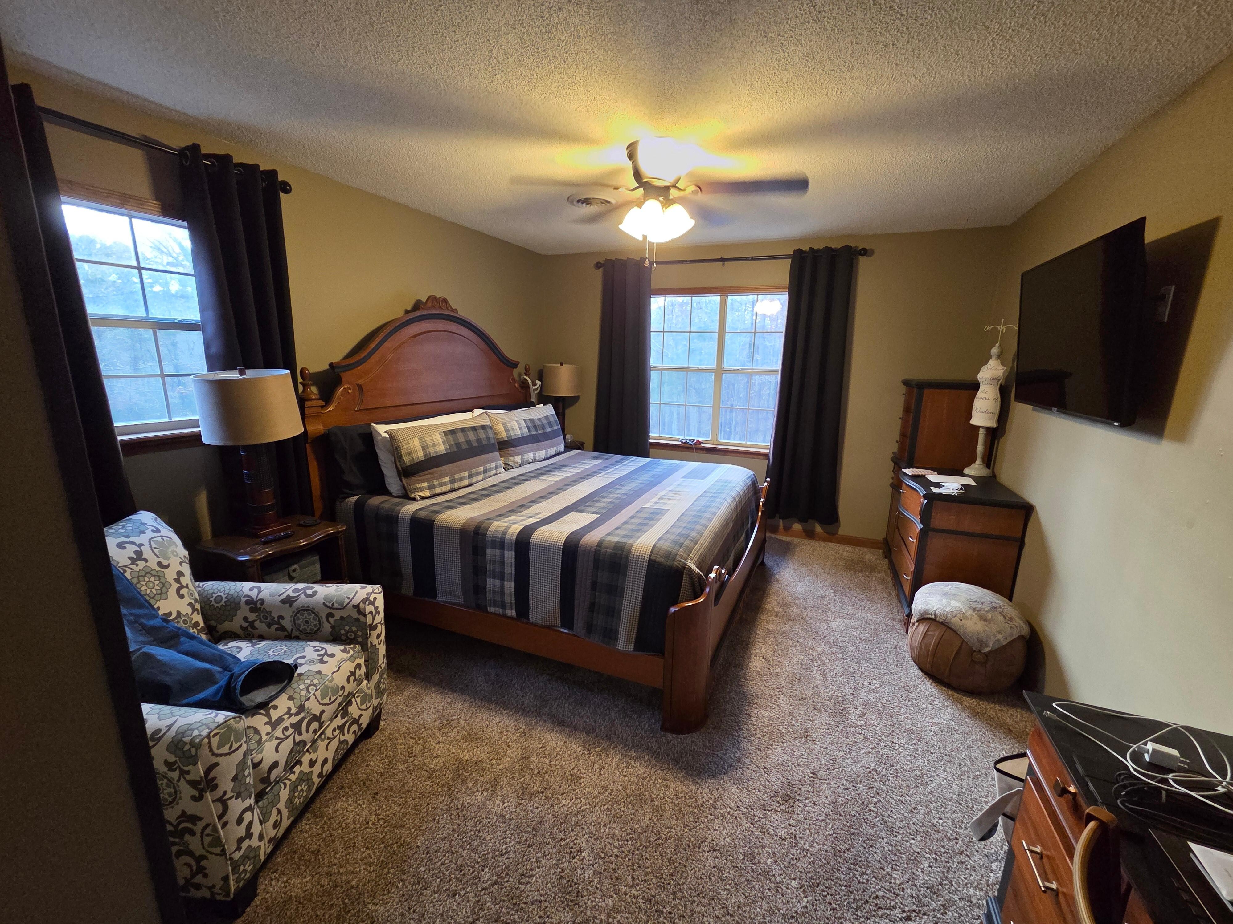The "master" bedroom is very comfortable! It has a walk in closet attached as well. There is also a desk in this room.