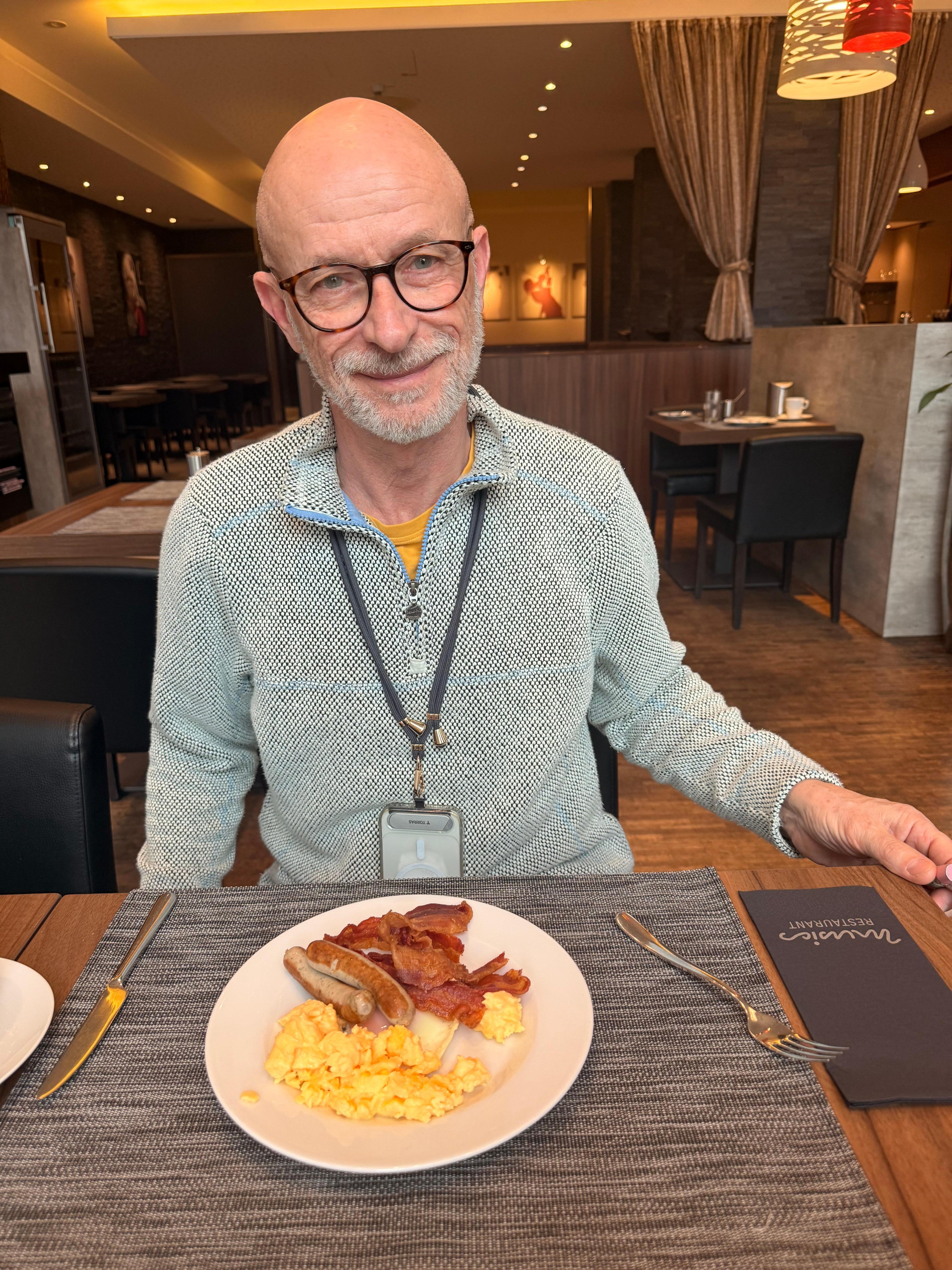 He loves the breakfast. 