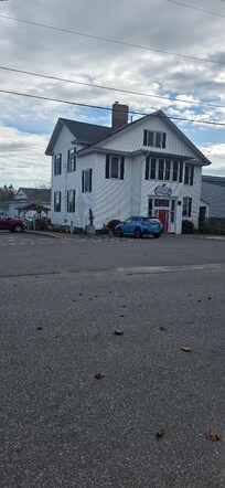 Former schoolhouse, now an Art Center is located directly across the street from the residence.