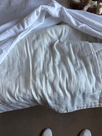Old discolored duvet