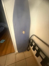 This is their ironing board in the room