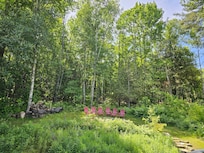 Cozy spot around the firepit. The stars at night are amazing!