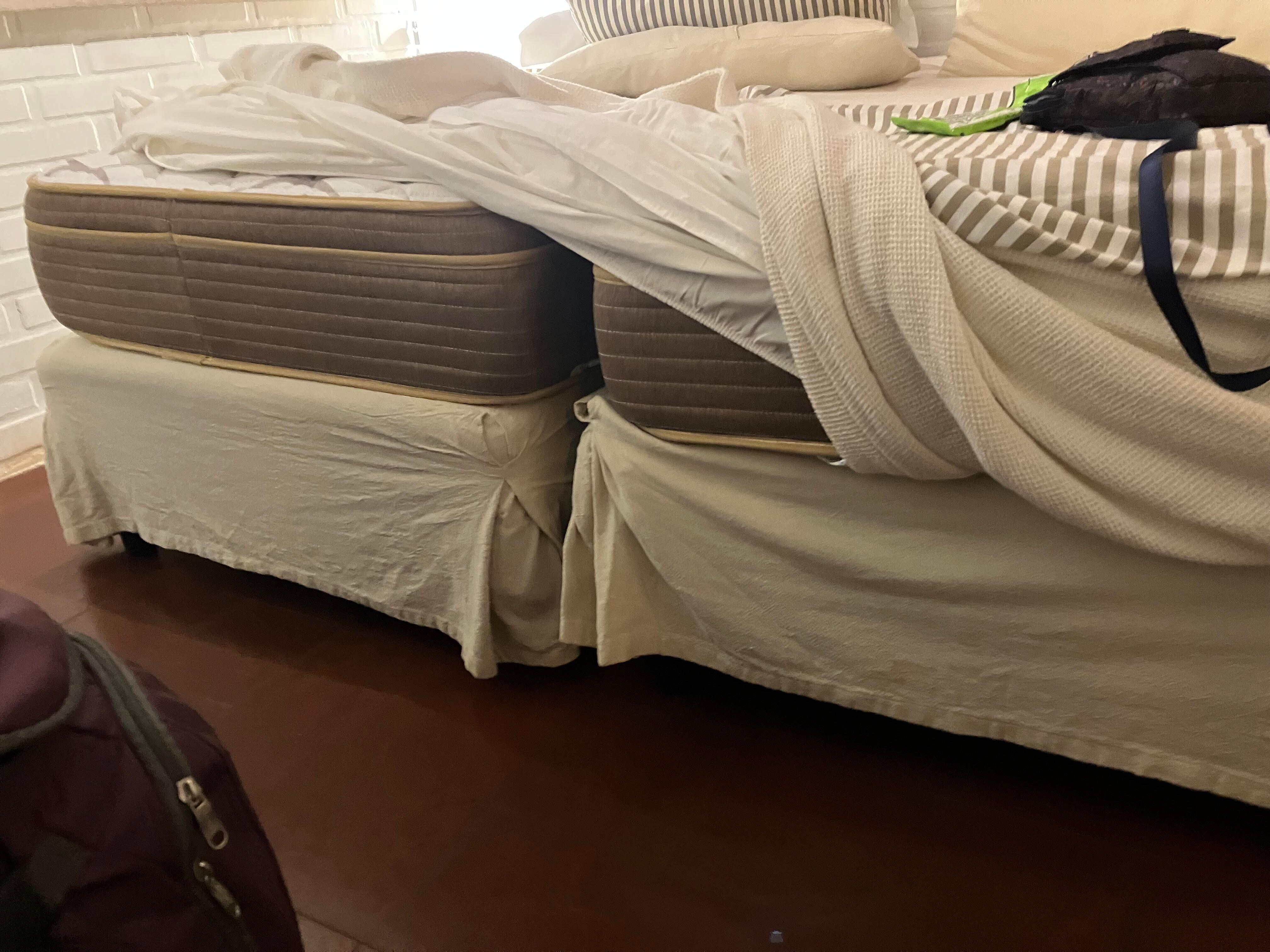 The bed she claimed was the same single bed every room had that couldn’t be separated. 