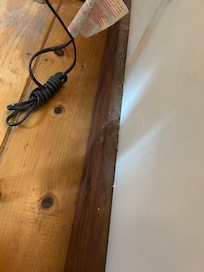 Dust behind master night stand