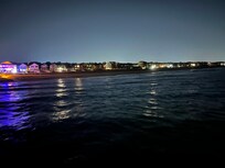 The beautiful night ocean from the pier next door