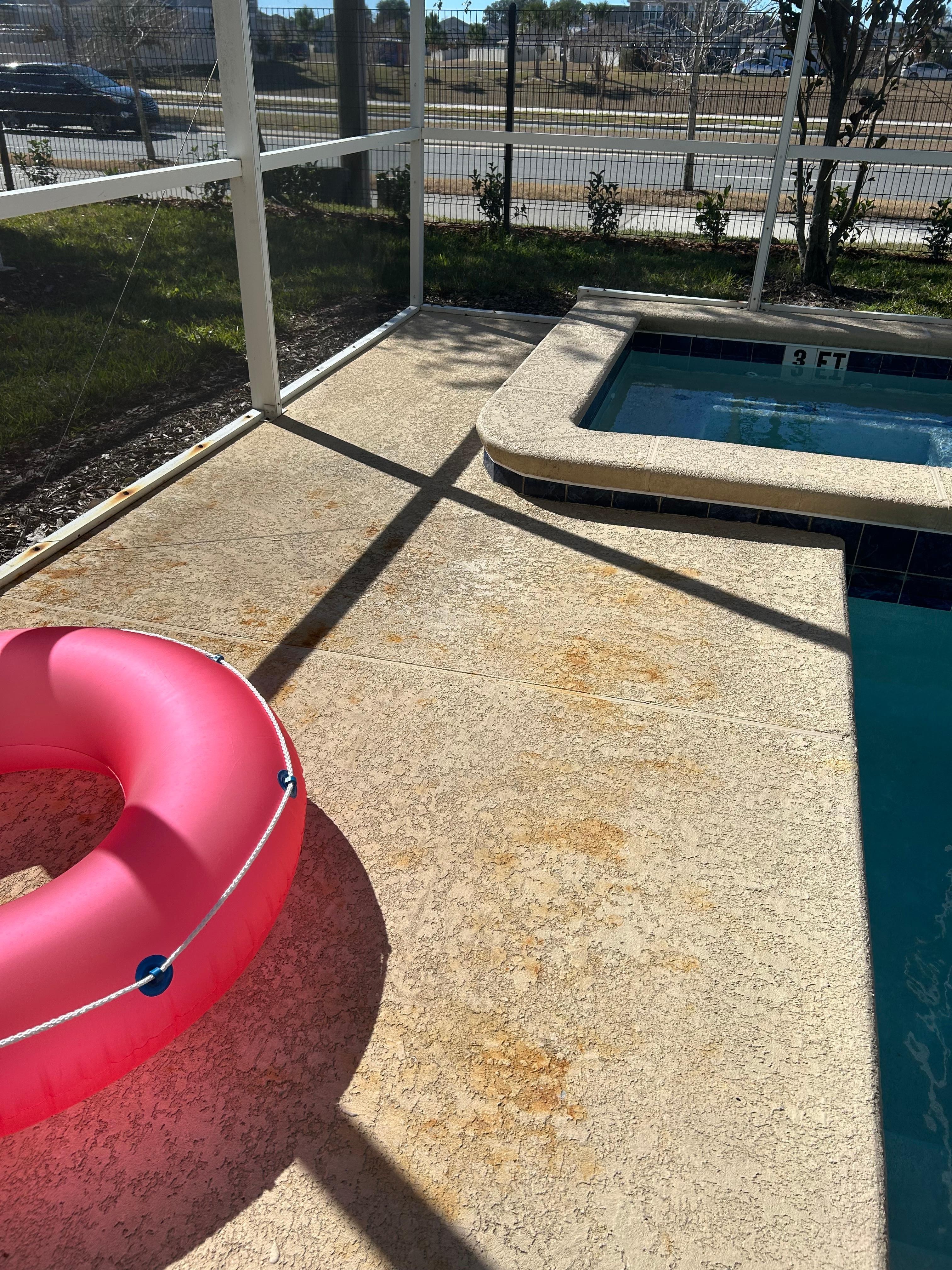 The pool area appears itinerary stained