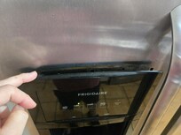 Loose/breaking fridge panel.