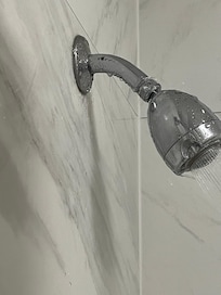 The shower head leaked water really bad