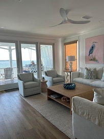 Serenity inside and out. We loved lazy days and ocean breezes on the oversized porch swing!