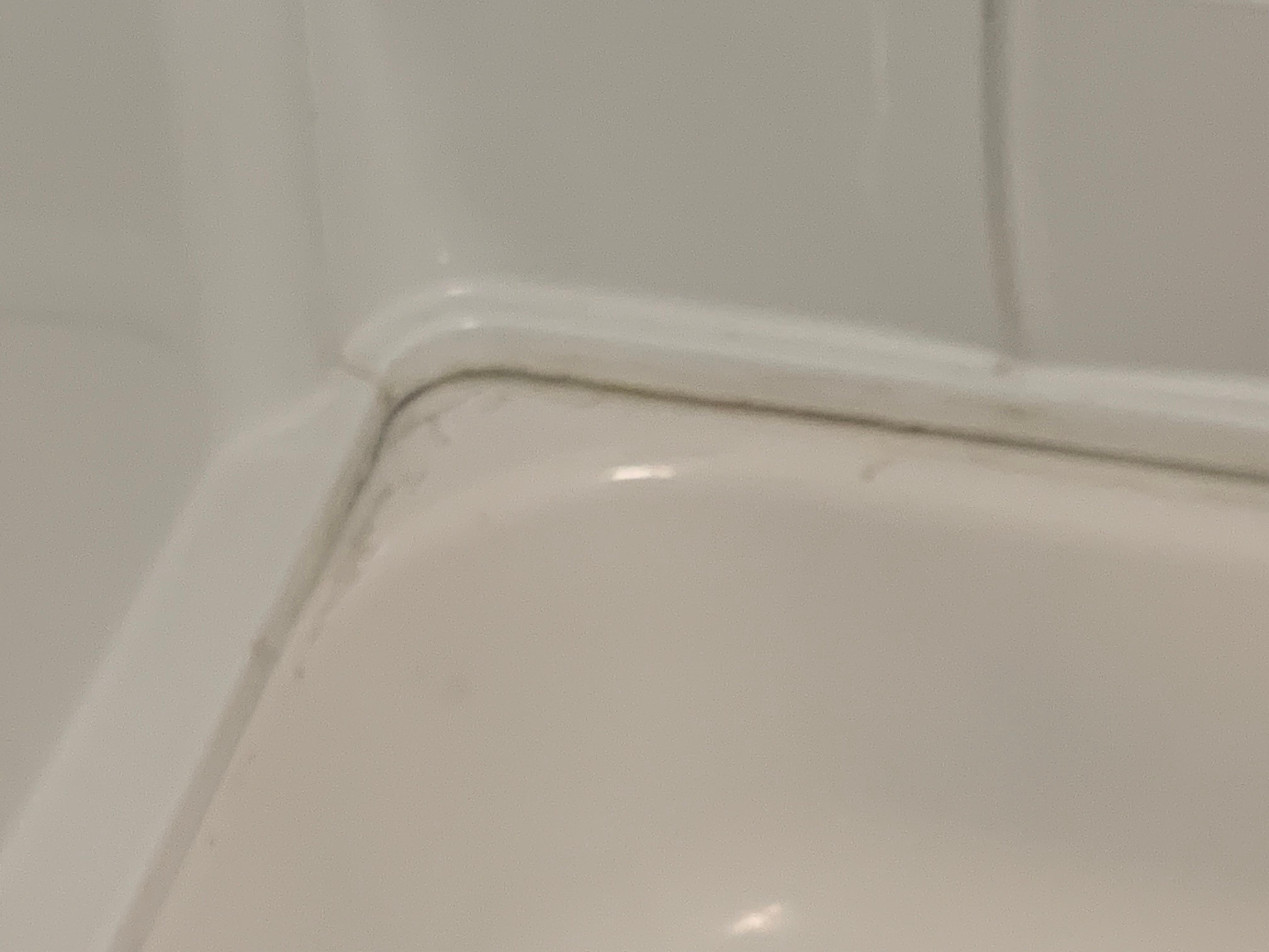 The tub seems to be separating from the wall 