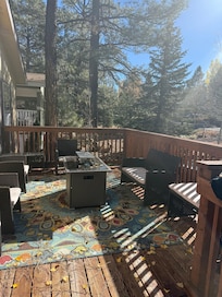 The front porch with fire-pit nice place to see the stars and enjoy smores.