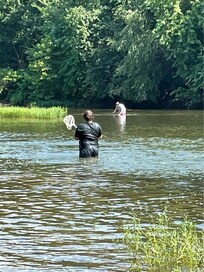 The boys spend everyday in the river having a blast.