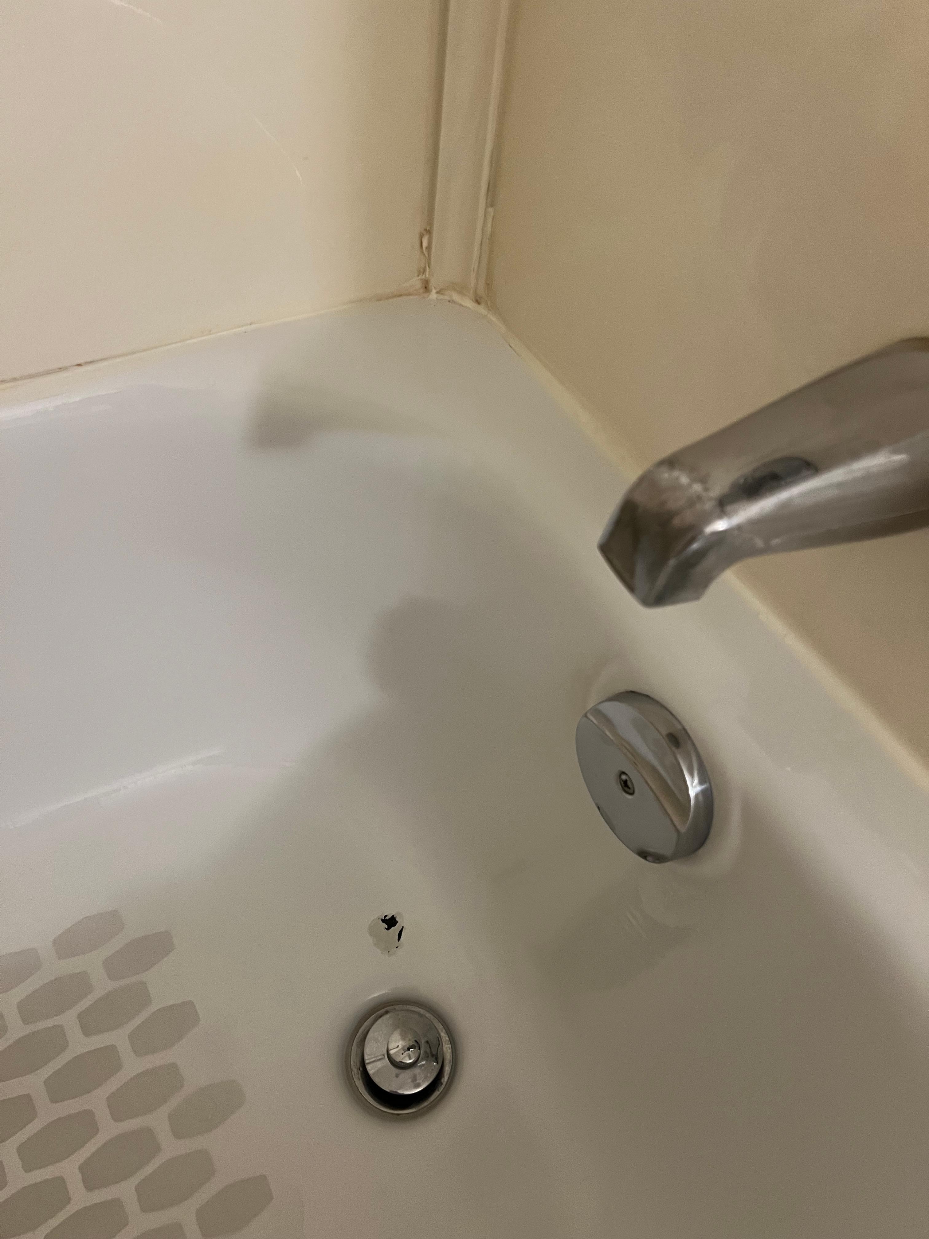 Dark old tub with damage