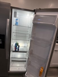 Refrigerator with food in it and not clean
