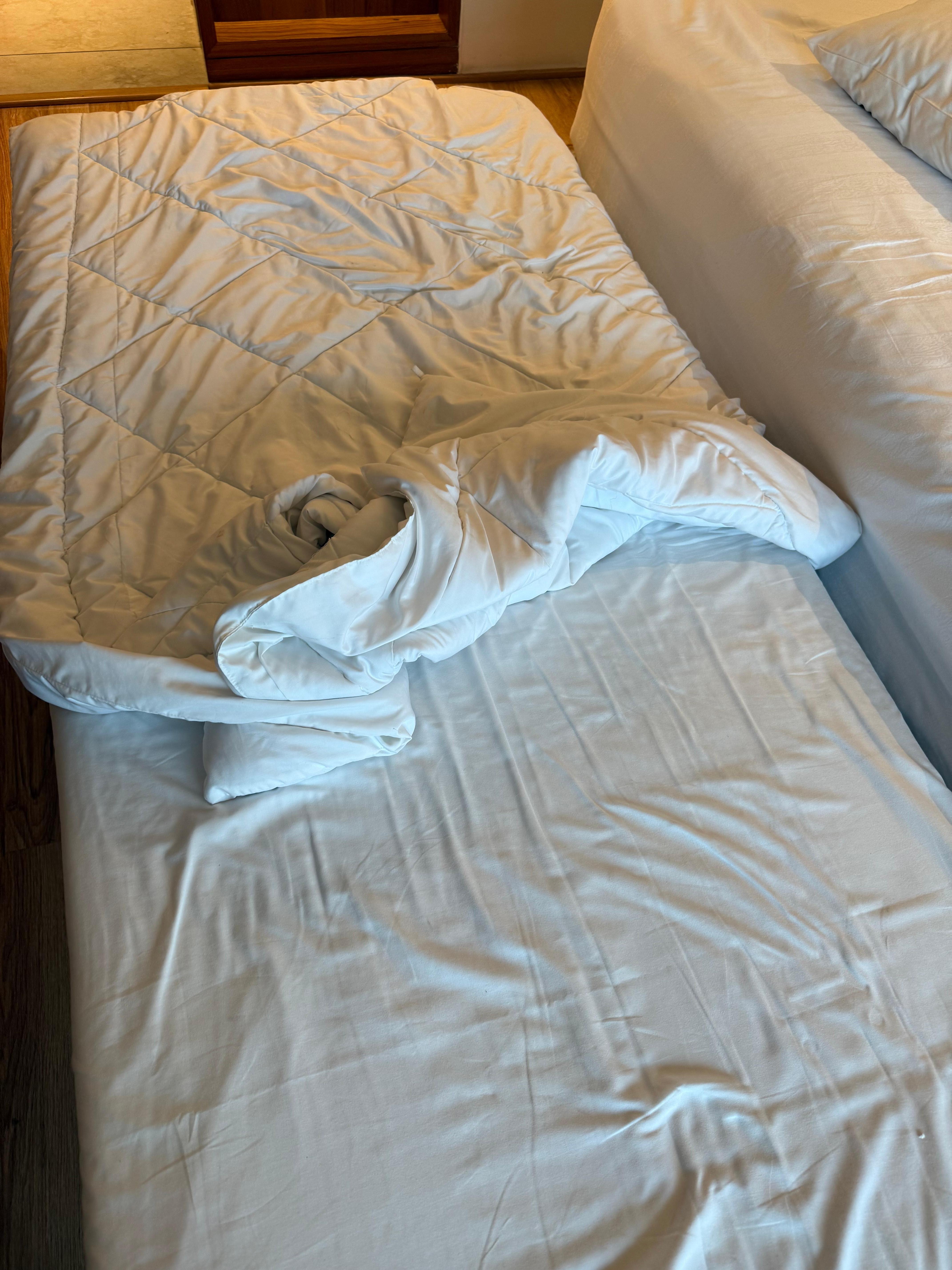 Duvet without a cover, super unhygienic!!