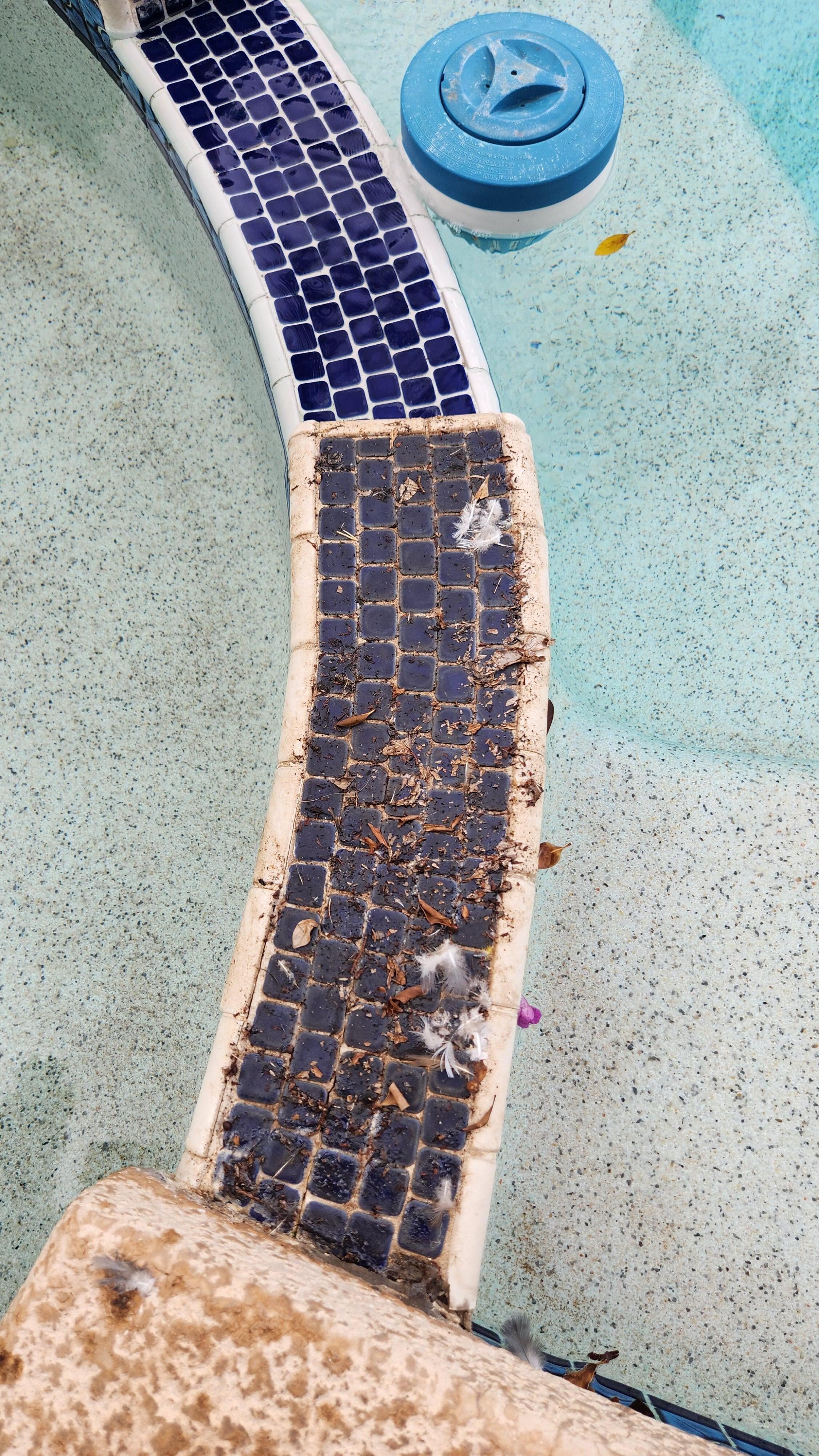 Sticky substance on the 2 side steps of hot tub