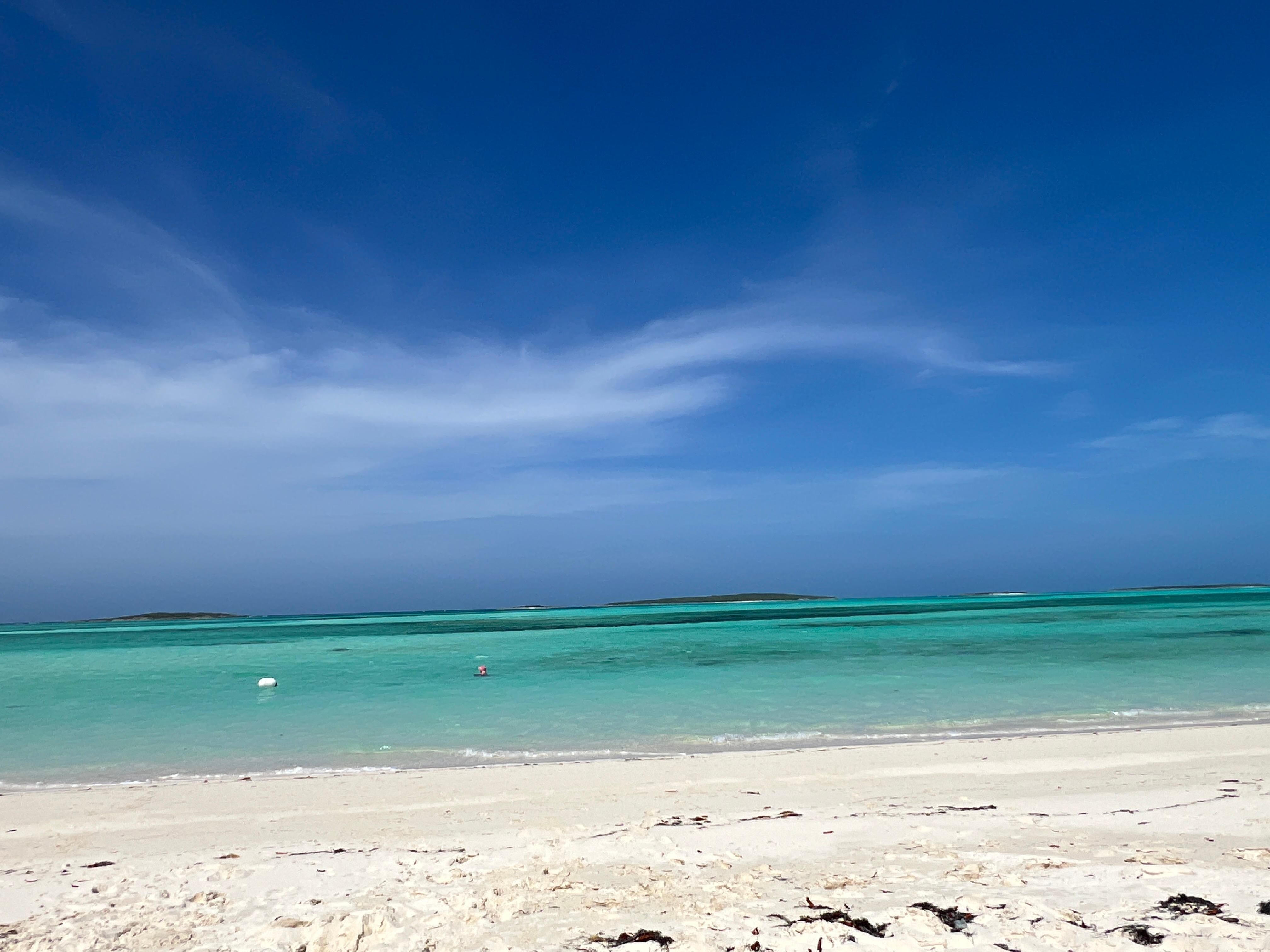 View from beach to beautiful blues of Exuma! 