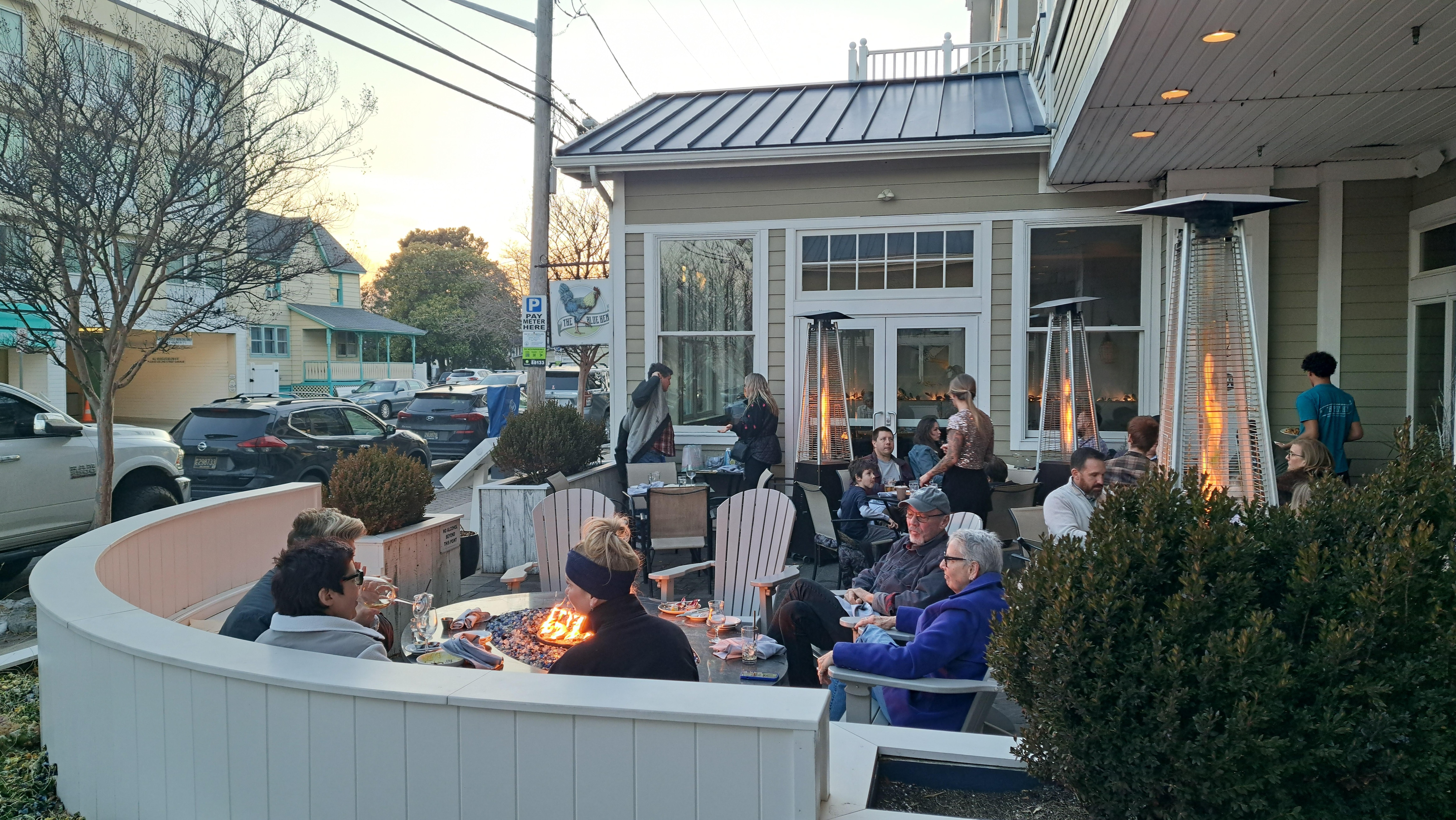 Outdoor sitting area, by main entrance.