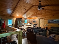 The kitchen/living room/common area upstairs.