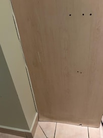 Particle board closet, warped from leaking A/C