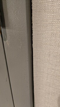 The wallpaper peeling off.