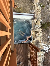 View of Hot tub from deck above