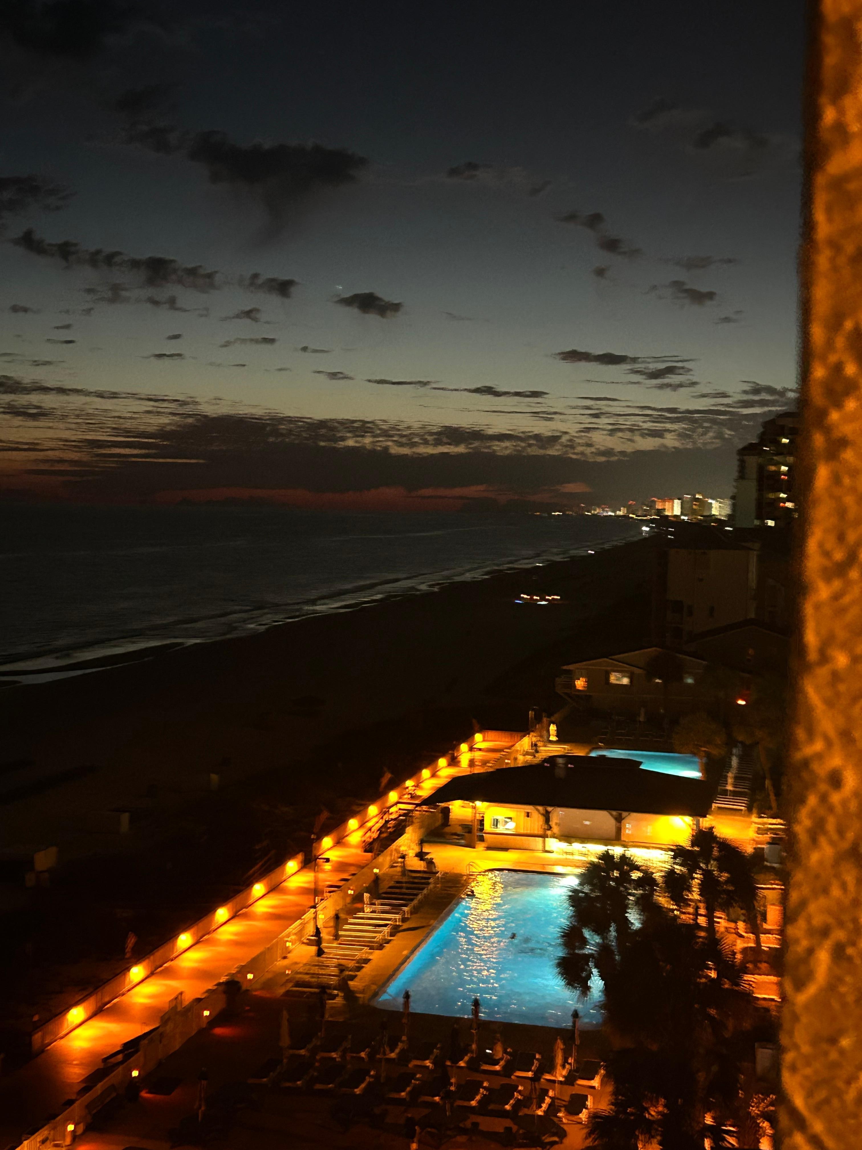 Night balcony looking towards pool area