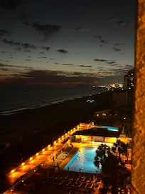 Night balcony looking towards pool area