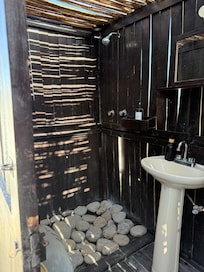 It’s a bit of a trick to stand on the rocks and shower. But the shower was awesome.