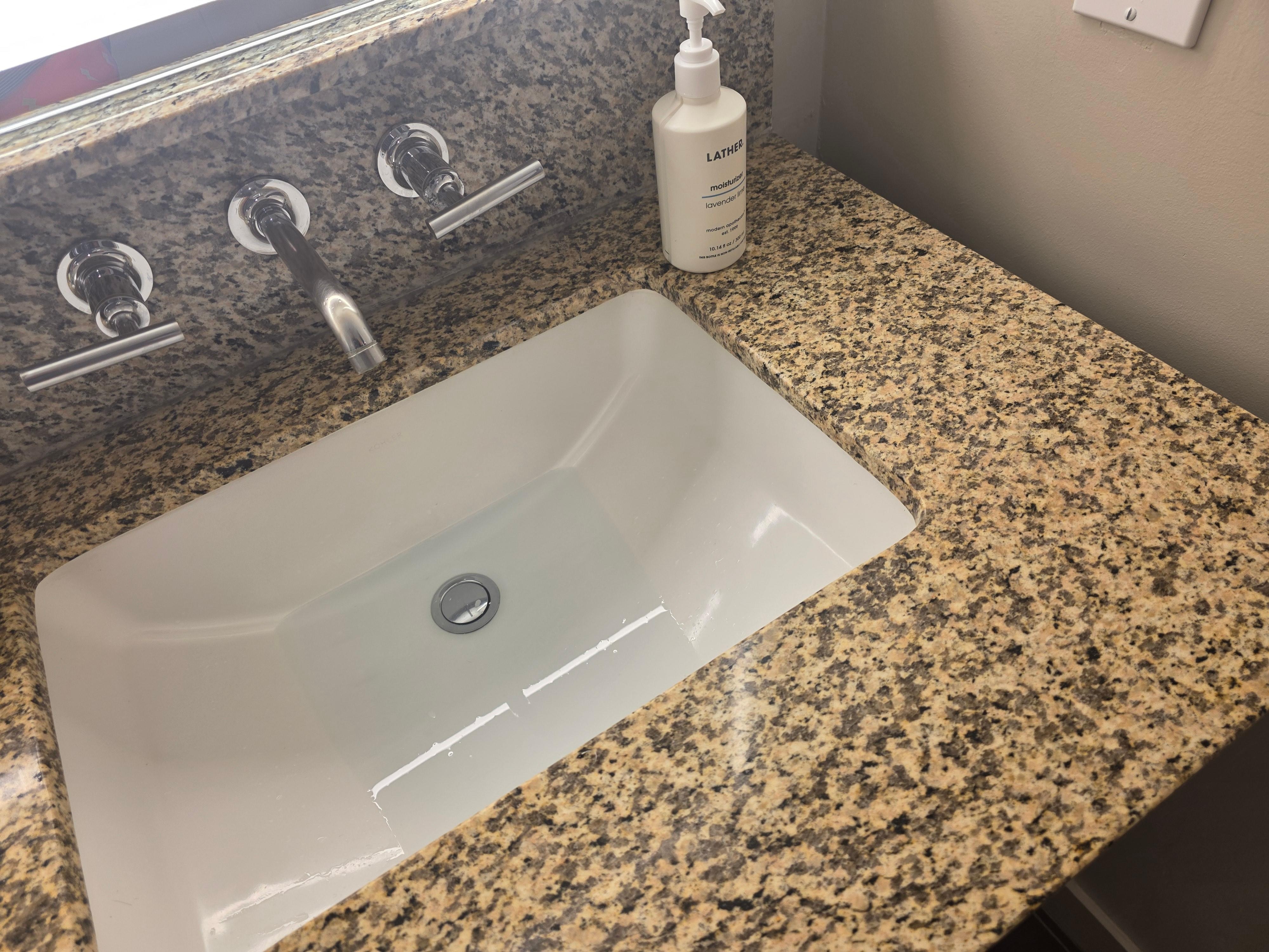 No valve to open drain sink. Therefore the sink was clogged from brushing my teeth, and washing my hands.