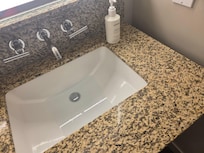 No valve to open drain sink. Therefore the sink was clogged from brushing my teeth, and washing my hands.