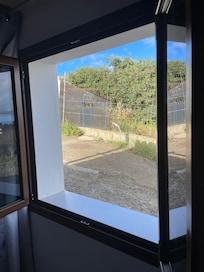 Photo taken from master bedroom looking across the road to the kennels.