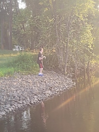 Fishing off of the river bank