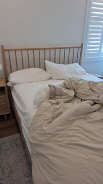 First floor bedroom with dirty sheets