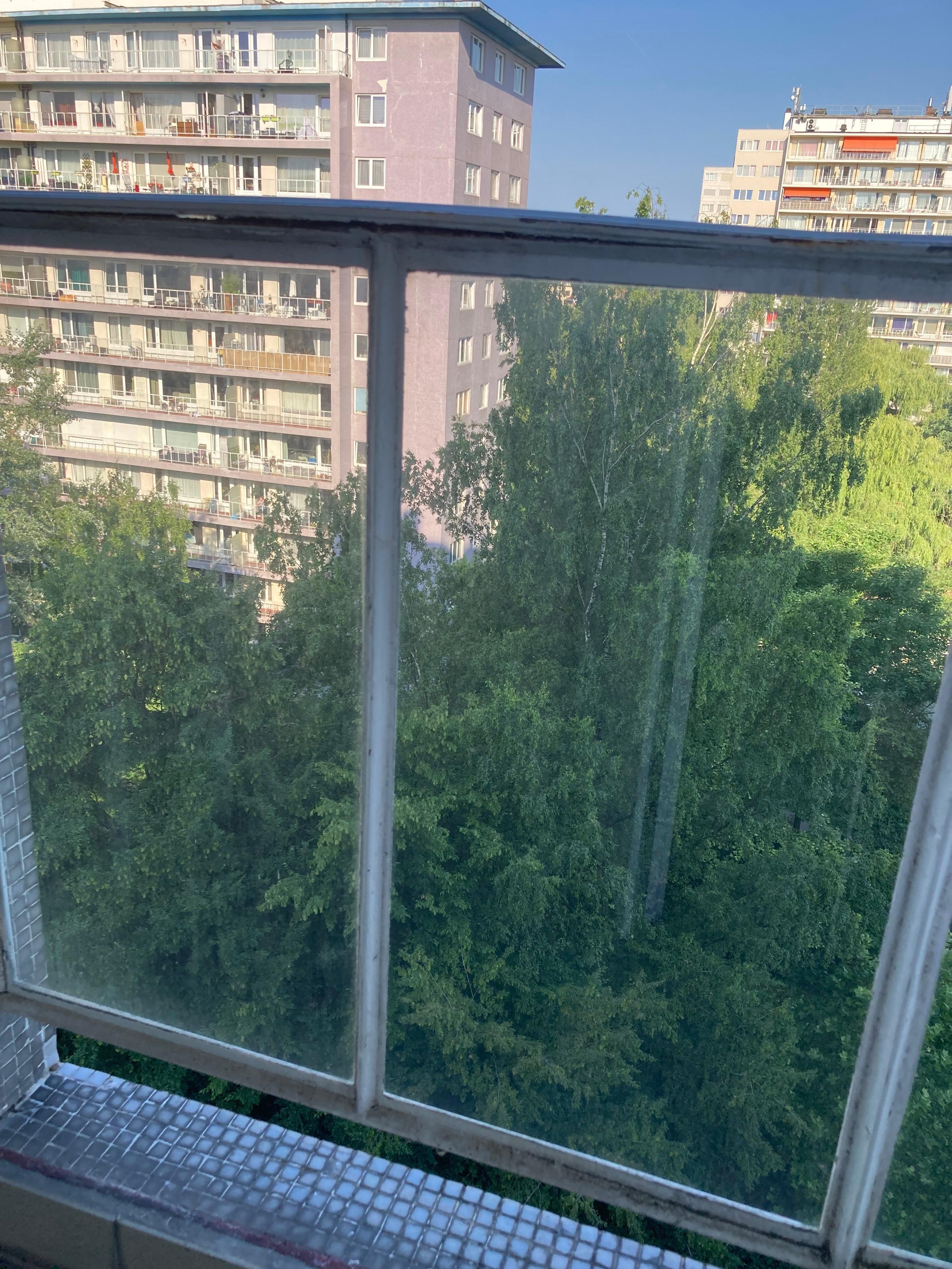 Rusty railing is separating from the balcony