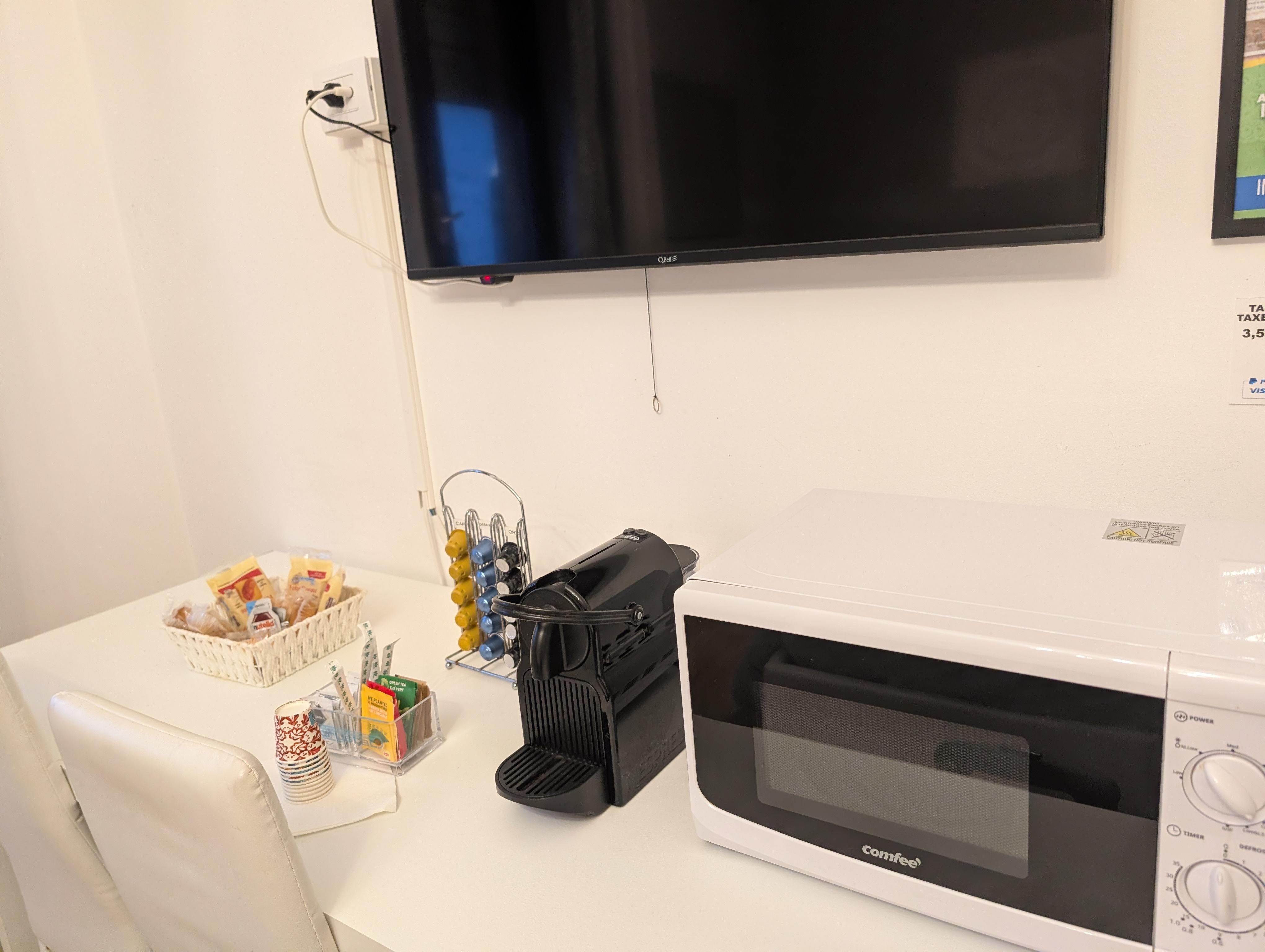 Television with netflix etc, microwave, coffee machine and complimentary coffee/tea and pastries. There is also a fridge in the rooms 