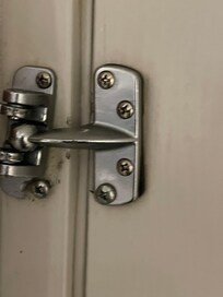 Broken safety lock on door