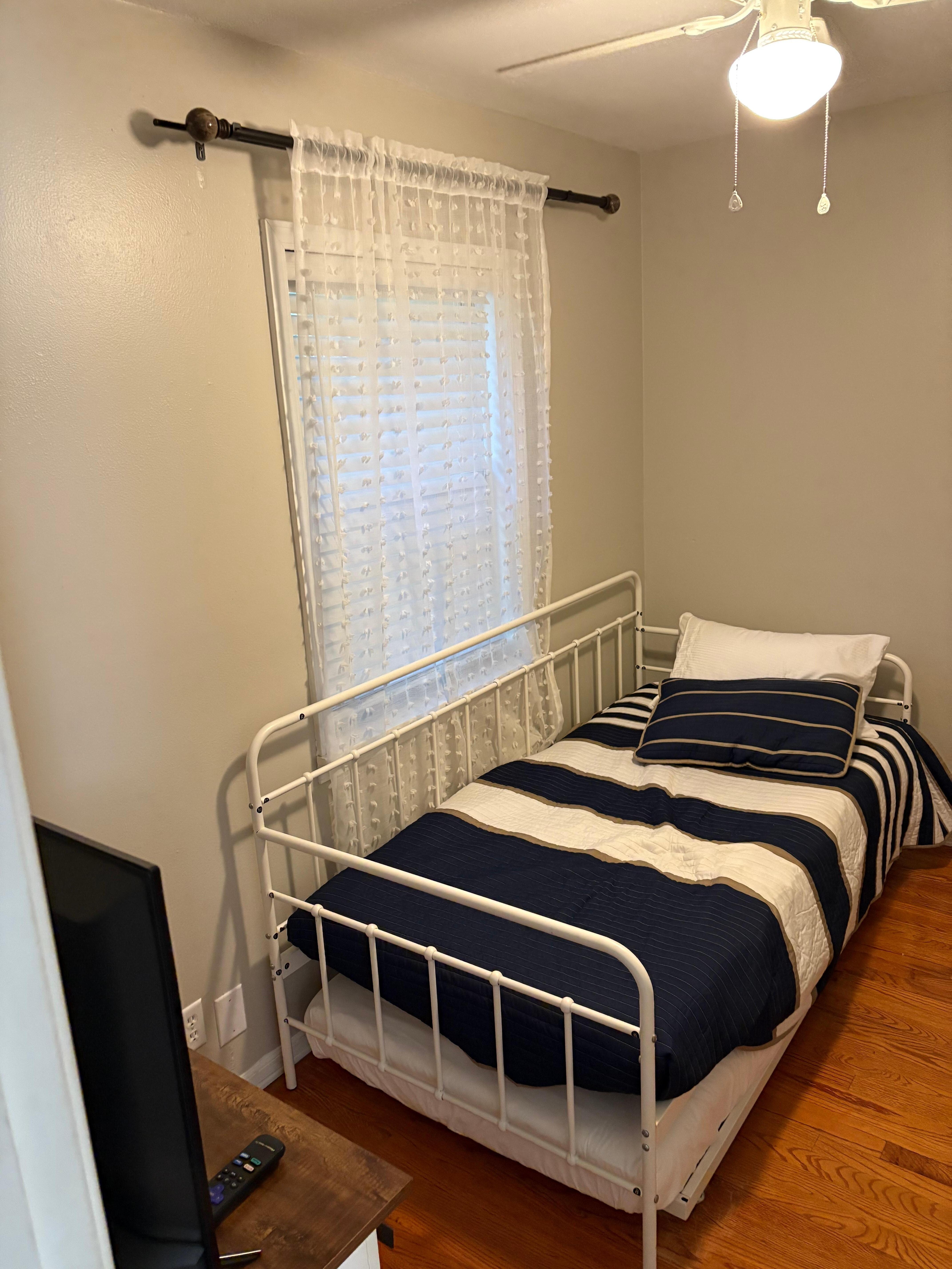 Bedroom with twin bed. Gets really hot in this room 