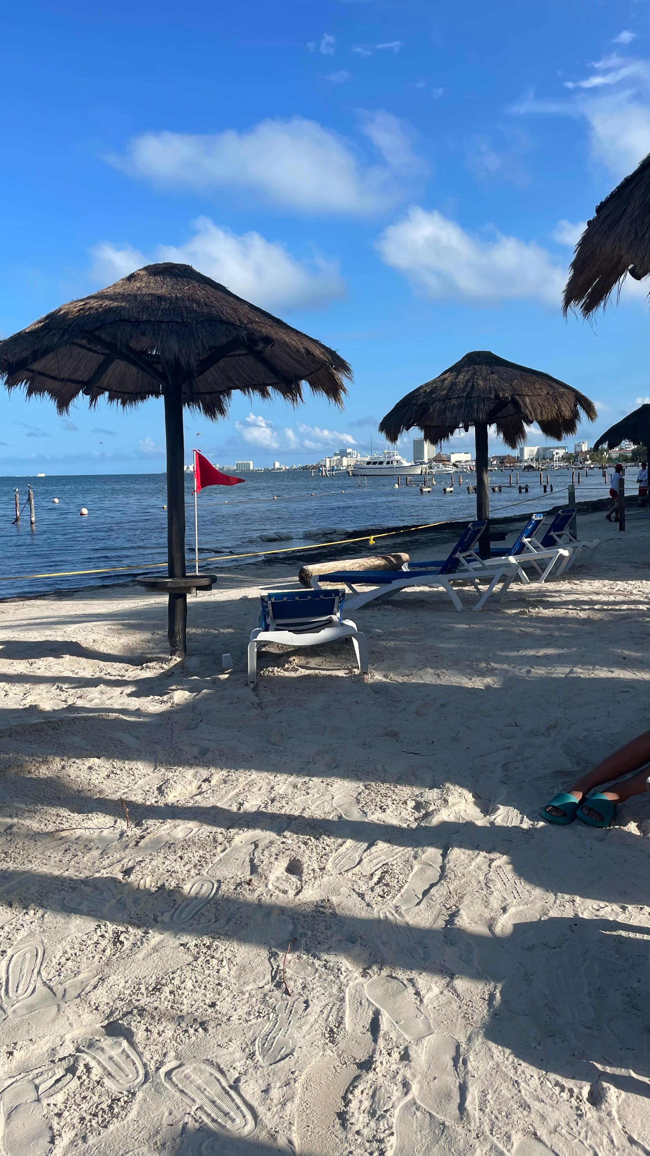 Sunbeds on small beach as well as by pool