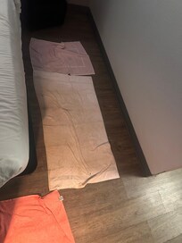 Water staining the towels given to us to cover the water coming up from the floorboards.